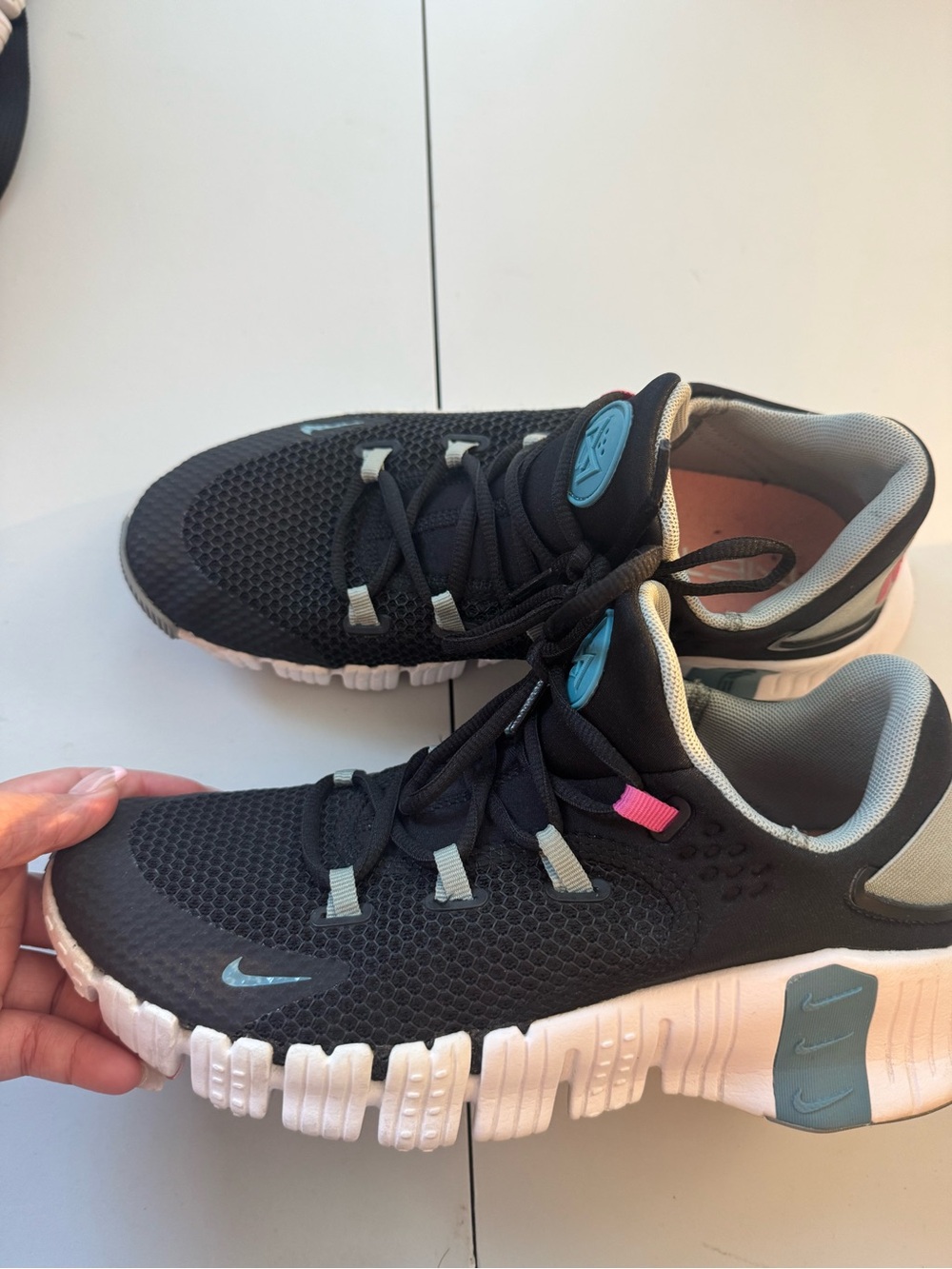Nike Metcon sneakers with Teal and Pink Accents